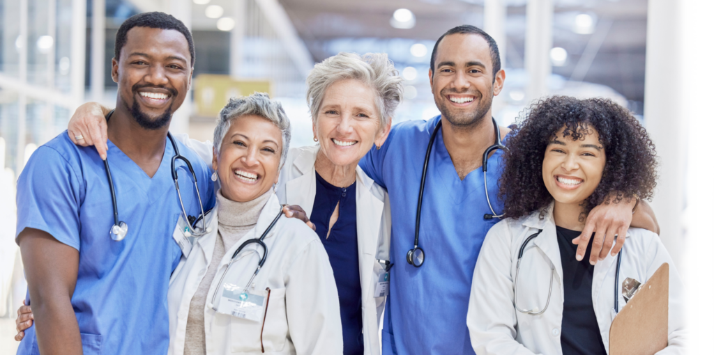 Group of doctors and nurses smiling