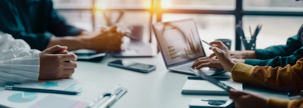 Technology and financial graphs on laptop screen